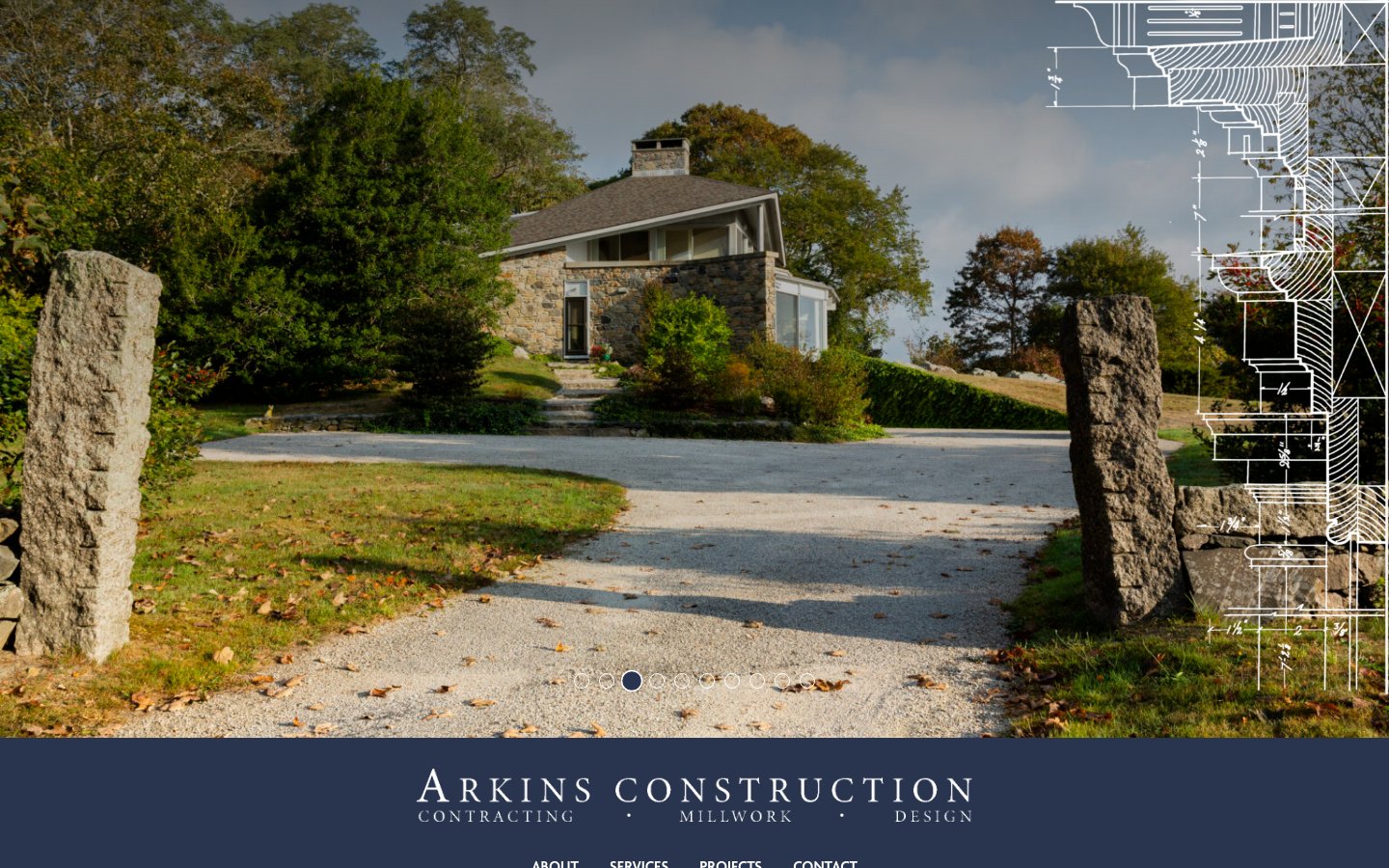 Arkins Construction homepage with a stone-walled driveway leading to a shingled home, architectural line drawings overlaid, and the navy Arkins Construction wordmark